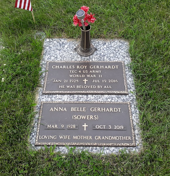 This Bronze Memorial honoring Gerhardt is a custom bronze monument is in a flat marker format as a companion memorial. Twin bronze markers with crosses mounted on grey granite with a flower urn are present in this memorial. Located at Valley View Cemetery Xenia, Ohio. It is appropriate for use with traditional interment or cremation.