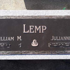 This Bronze Memorial honoring Lemp consists of a bronze plaque is mounted on a flat, companion marker. The memorial features a US Airforce emblem, wedding rings, a teddy bear, and decorative floral scrollwork. Located at Woodland Cemetery Dayton, Ohio. It is suitable for use with cremation or traditional interment.