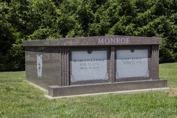This Monroe Companion Family Mausoleum is crafted from Mahogany granite. It has a family crest engraved on the side. It is located at Rose Hill Cemetery in Mason, Ohio. This memorial is appropriate for use with traditional interment or cremation.