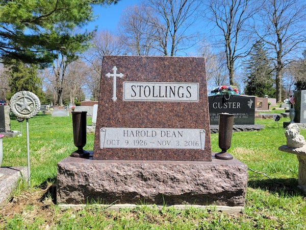 This Single Upright in Carnelian Mahogany is crafted from Carnelian Mahogany granite with engraving and vases. It is located at Woodland Cemetery in Xenia, Ohio. This memorial is appropriate for use with cremation or traditional interment.