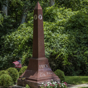 The Frick Family Estate Memorial is crafted from polished red granite. It is an obelisk shape with carved capital letter F in four sides of the stone at the top. The base communicates the memorial information. This monument is suitable for use with cremation or traditional interment.