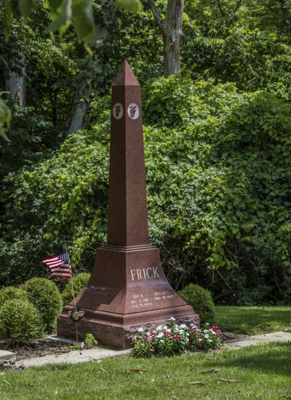 The Frick Family Estate Memorial is crafted from polished red granite. It is an obelisk shape with carved capital letter F in four sides of the stone at the top. The base communicates the memorial information. This monument is suitable for use with cremation or traditional interment.
