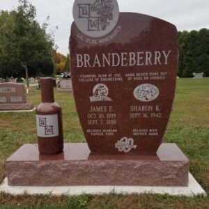 The Brandeberry memorial is a Custom Companion Upright for a Lil' Old Vintner and was crafted from India red granite. It is located at Enon Cemetery in Enon, Ohio. This custom memorial features custom artwork and a custom vase. It is suitable for cremation or traditional interment.