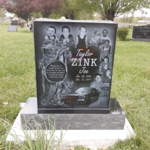This Single Upright with Laser Engraved Car and images of the decedent throughout his life is crafted from polished black granite. This memorial is appropriate for use with cremation or traditional interment.