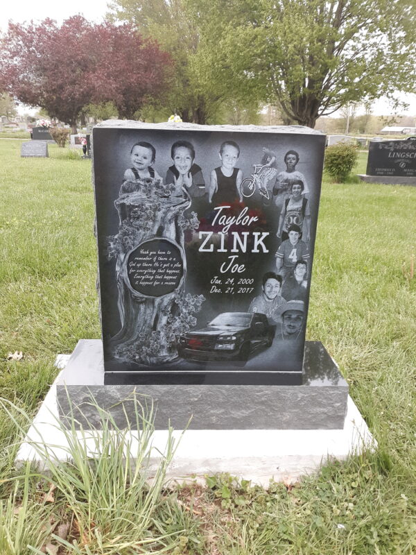 This Single Upright with Laser Engraved Car and images of the decedent throughout his life is crafted from polished black granite. This memorial is appropriate for use with cremation or traditional interment.