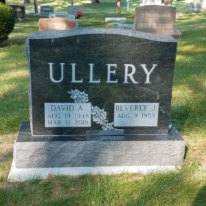This Companion Upright in Gem Mist was crafted from Rock of Ages Gem Mist granite and is located at Davids Cemetery in Dayton, Ohio. The Ullery family choose a simple floral design for in between the names. It is suitable for cremation or traditional interment.