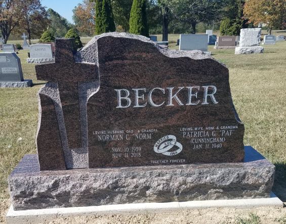 This Custom Cross Companion Upright memorial for the Becker family was crafted from rustic brown granite. It is located at Dayton Memorial Park Cemetery. It is appropriate for traditional interment or cremation.