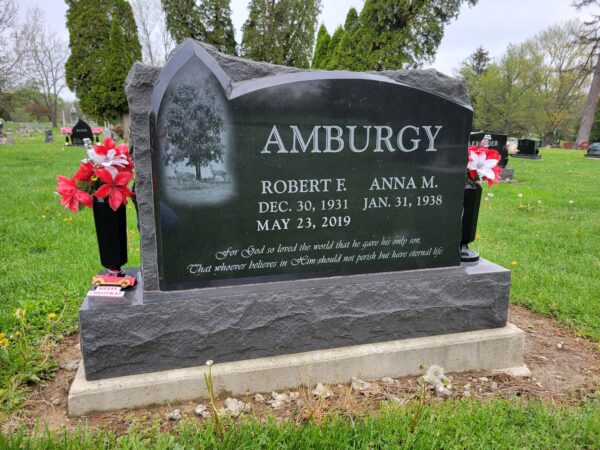 This Custom Companion Upright with Tree was crafted for the Amburgy family from Asian black granite and features a custom laser engraving. It is located at Miami Cemetery in Corwin, Ohio. It is suitable for cremation or traditional interment.