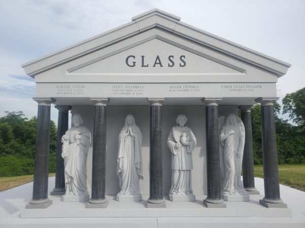 The Glass Estate Memorial is in the style of a Greek Temple with 4 sculpted Catholic Saints and a full patio.