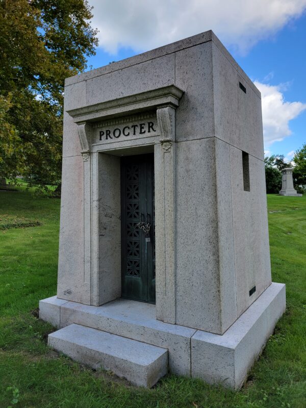 The Historic Proctor Mausoleum is crafted from gray granite in a cubic, art deco style. It honors William Protor, co-founder of Proctor and Gamble corporation.