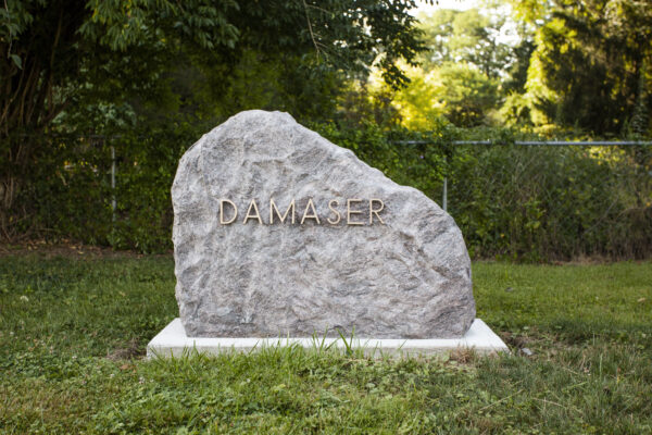 This Companion Memorial Boulder was crafted from rough pink granite and features a custom bronze setting with the decedent's family name. This memorial is popular with families who choose cremation. It is also appropriate for use with traditional interment.