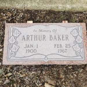 This single flush marker in rose granite features a carving of a book outline with ivy scrollwork. This memorial is suitable for use with cremation or traditional interment.
